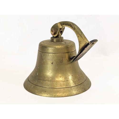 114 - A large vintage brass bell. 20x20cm