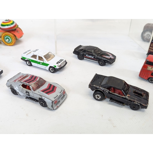 122 - A collection of vintage toy cars, 6 by MatchBox, 4 by Corgi,  1 by Siku in West Germany, with a vint... 