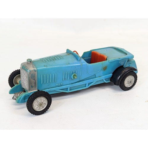 123 - 3 vintage toy cars, 1 made by Louis Marx and Co., 1 made in Hong Kong, etc. Largest 18.5cm