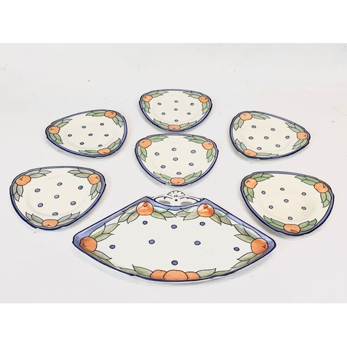 422 - 7 pieces of 1920’s Charlotte Rhead “Garland” pattern pottery for Burleigh Ware. Including a sandwich... 