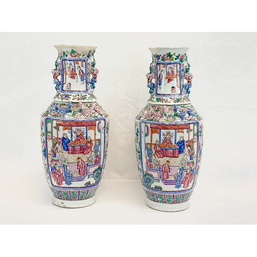 426 - A pair of large 19th century Chinese Famile Rose Canton Vases. 26 x 62.5cm.