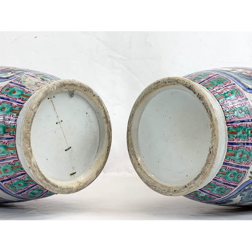 426 - A pair of large 19th century Chinese Famile Rose Canton Vases. 26 x 62.5cm.