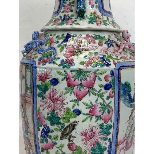 426 - A pair of large 19th century Chinese Famile Rose Canton Vases. 26 x 62.5cm.