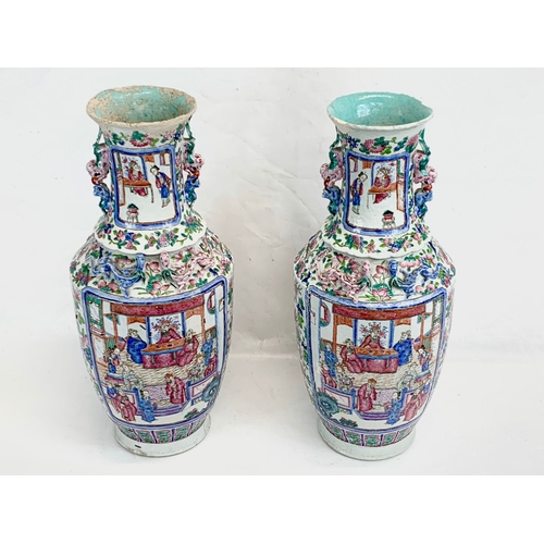 426 - A pair of large 19th century Chinese Famile Rose Canton Vases. 26 x 62.5cm.