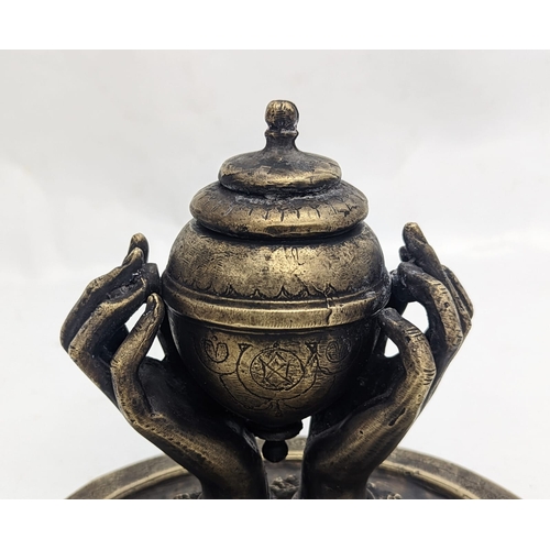 135 - An early 20th century bronze ink well. 16.5x14cm