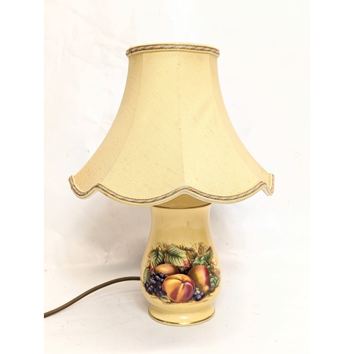 429 - An Aynsley Orchard Gold pattern lamp. Without shade, 10x18cm