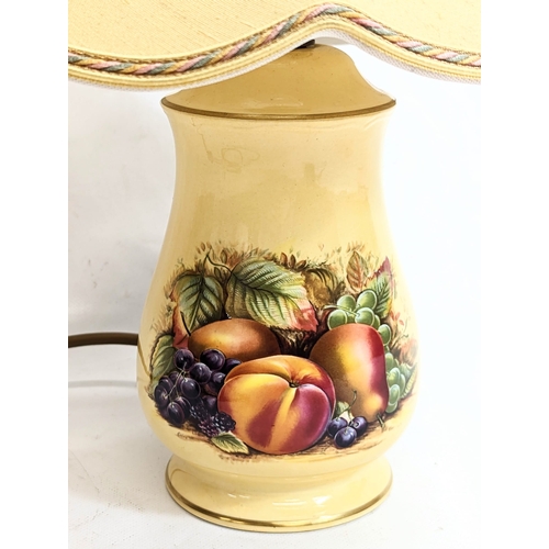 429 - An Aynsley Orchard Gold pattern lamp. Without shade, 10x18cm