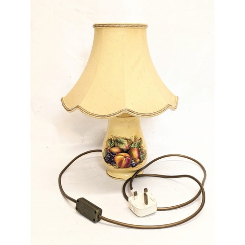 429 - An Aynsley Orchard Gold pattern lamp. Without shade, 10x18cm