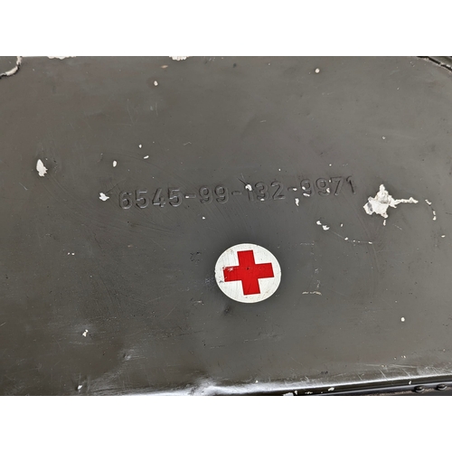 138 - A large military First Aid case. 60x41x25.5cm