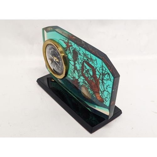 139 - A decorative French resin mantle barometer. 17.5x11.5cm