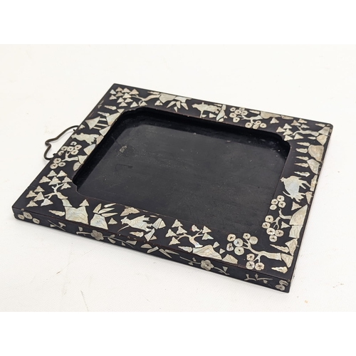 140 - An early 20th century Chinese hanging frame inlaid with Mother of Pearl. 21.5x25cm