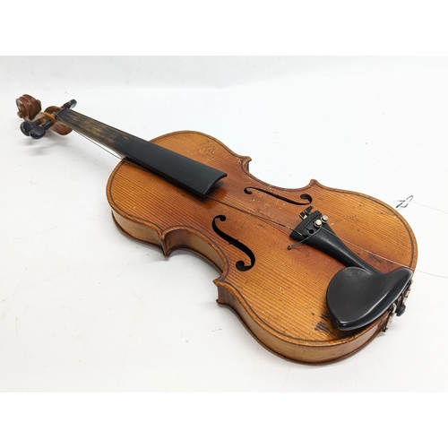 148 - A vintage violin in case