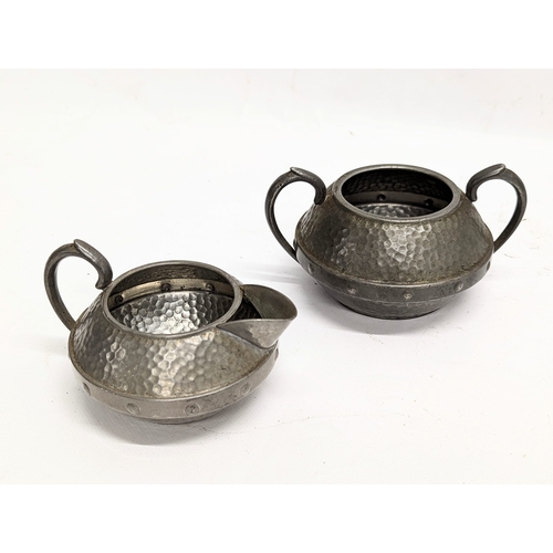 437 - A quantity of 19th and early 20th century pewter. Including James Dixon & Sons, Craftsman Sheffield,... 