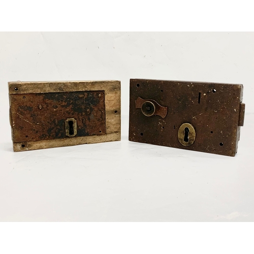 156 - 2 large 19th century door locks. 23cm