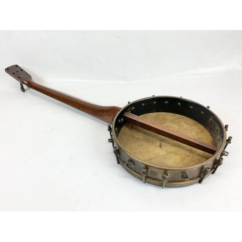 157 - A late 19th century rosewood banjo. 88cm