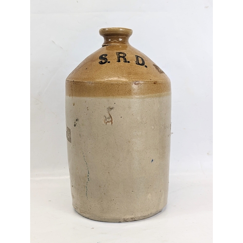 160 - 2 early 20th century stone jars. 32cm