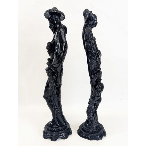 439 - A pair of large resin Chinese figures. Tallest measures 49cm