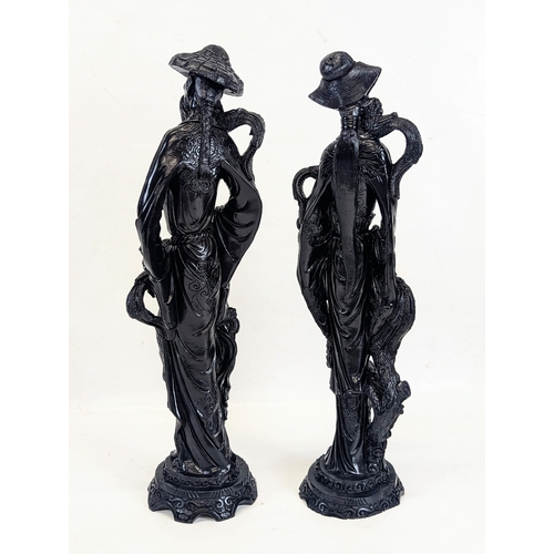 439 - A pair of large resin Chinese figures. Tallest measures 49cm