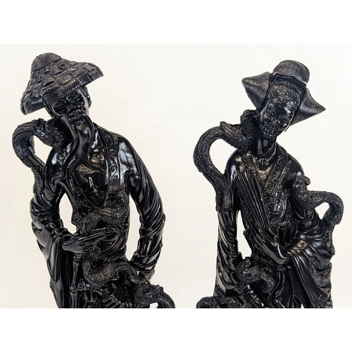 439 - A pair of large resin Chinese figures. Tallest measures 49cm