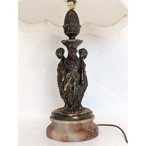 441 - An ornate table lamp on marble base. Without shade, 50cm