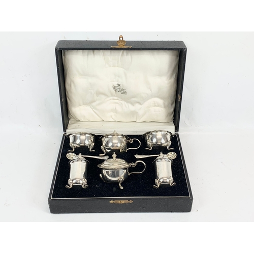 442 - A silver plated cruet set in case by Werr & Sons