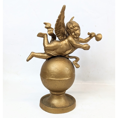 165 - A pair of early 20th century gilt cast iron cherubs. 21.5x28.5cm