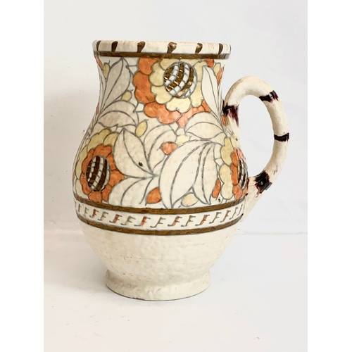 446 - A 1930’s Charlotte Rhead jug for Crown Ducal. 22cm.