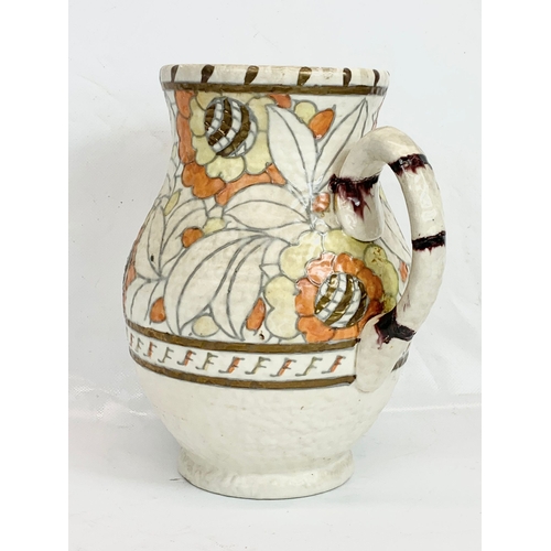 446 - A 1930’s Charlotte Rhead jug for Crown Ducal. 22cm.