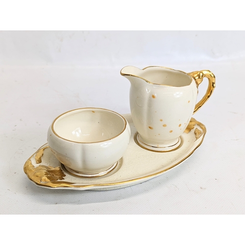 452 - A 1930s Royal Winston pottery set.