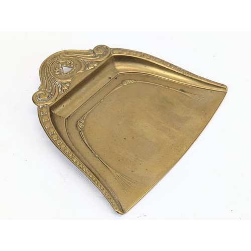 179 - A Victorian style brass crumb tray and brush.