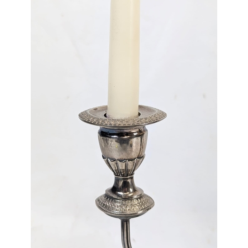 463 - A Regency style silver plate candlestick. 37x28cm