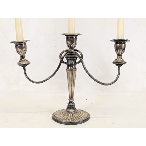 463 - A Regency style silver plate candlestick. 37x28cm