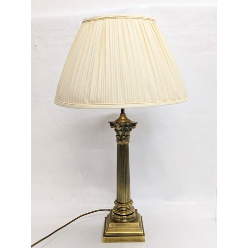 190 - A vintage brass Corinthian pillar table lamp. 54cm