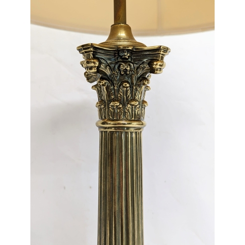 190 - A vintage brass Corinthian pillar table lamp. 54cm