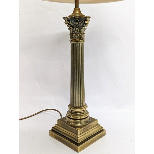 190 - A vintage brass Corinthian pillar table lamp. 54cm