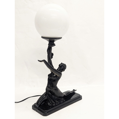 191 - An Art Deco style table lamp. 27x46cm