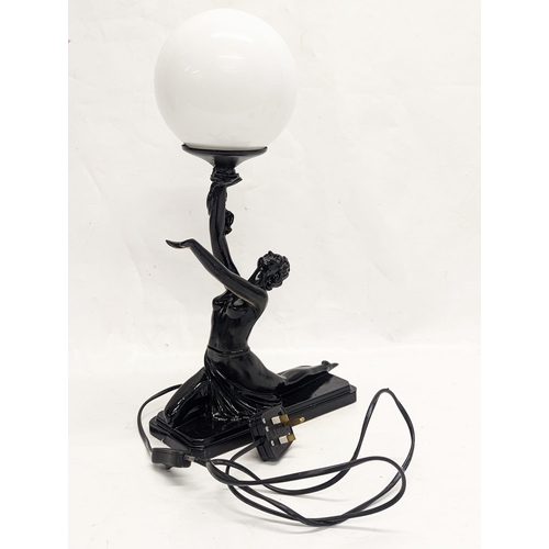 191 - An Art Deco style table lamp. 27x46cm