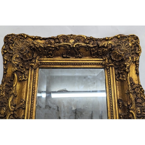 193 - An ornate gilt frame wall mirror, from Carvers & Gilders. 42x46cm