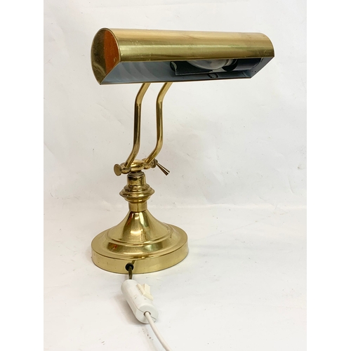 196 - A brass desk lamp. Highest 38cm