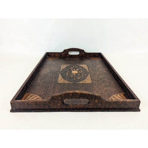 201 - An Edwardian Pokerwork  serving tray. 55x38cm