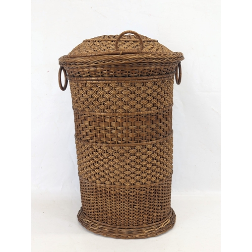 205 - An Edwardian wicker hamper. 57cm