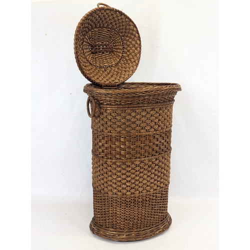 205 - An Edwardian wicker hamper. 57cm