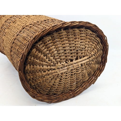 205 - An Edwardian wicker hamper. 57cm