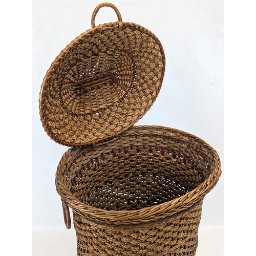 205 - An Edwardian wicker hamper. 57cm