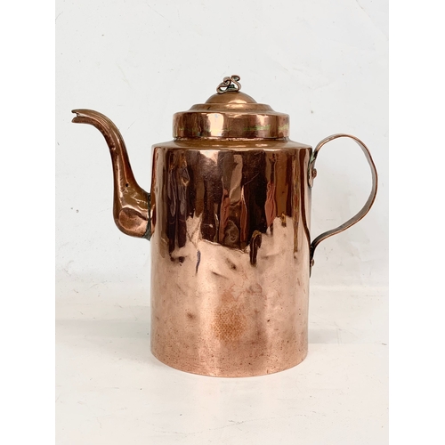 211 - A large Victorian copper kettle. 27 x 25cm