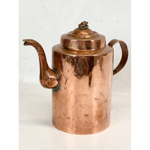 211 - A large Victorian copper kettle. 27 x 25cm