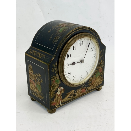 215 - An early 20th century chinoiserie mantle clock with key. French works. 13 x 14cm