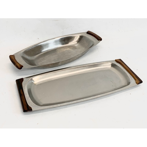 216 - 2 Danish rosewood and stainless steel serving trays by Lundtofte. 36cm