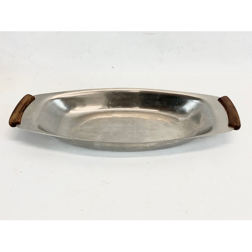 216 - 2 Danish rosewood and stainless steel serving trays by Lundtofte. 36cm