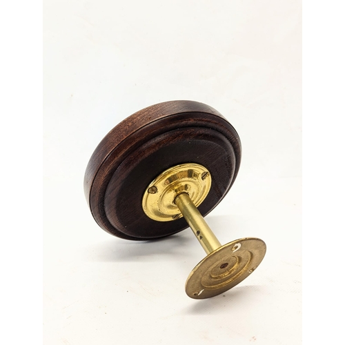 223 - A pair of vintage mahogany and brass door pulls. 14.5cm